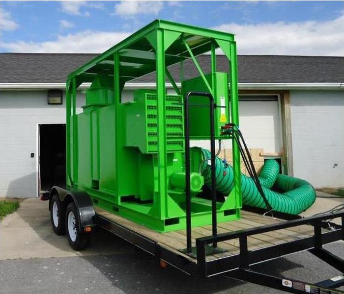 Large size drying equipment on top of attached trailer.
